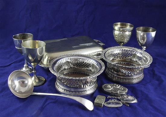 A pair of Edwardian silver plated wine coasters with turned wooden bases, 6.5in and twelve other miscellaneous plated items.